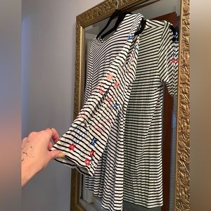 Spense top with cut out sleeves and floral embroidery